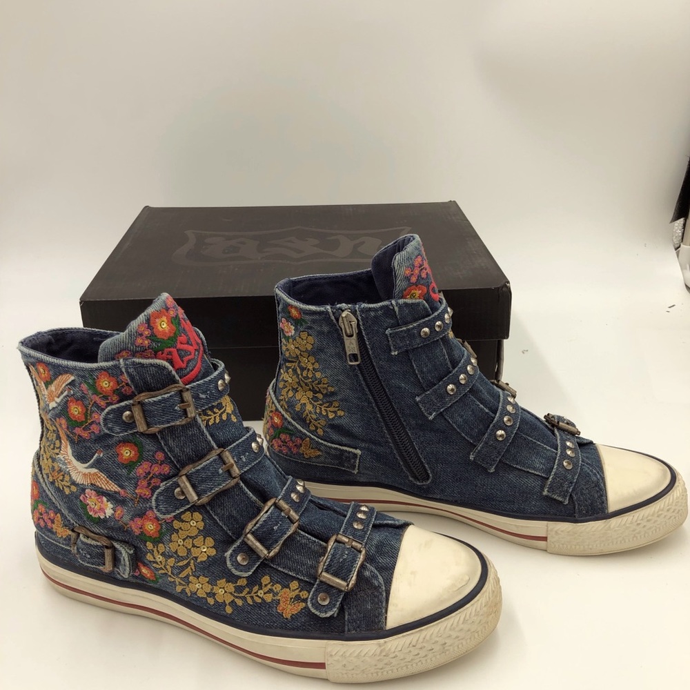 High top embroidered tennis shoe